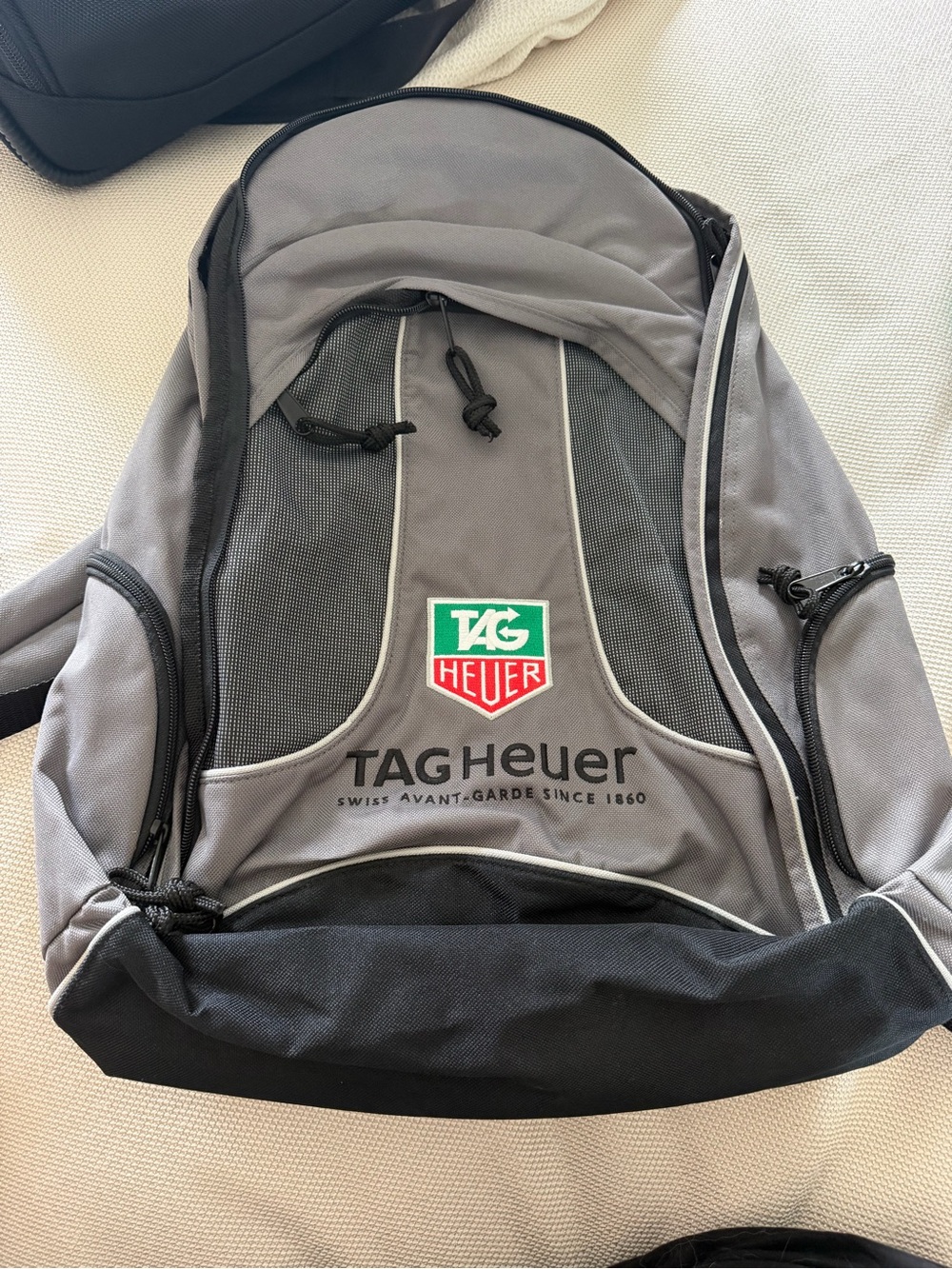 Tag Heuer Gray and Black Logo Backpack with Green & Red Badge